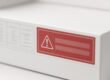Close-up of a product package label with a red warning panel